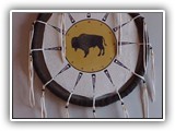 Hand-painted on leather and tied in a hoop for lovely wall decor.  Assorted designs, nature, critters, etc.  They can also be "welcome" signs for a lodge look.