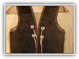 Buffalo vest trimmed in leather, antler buttons and leather thong.  Available either full buffalo, or with a buffalo front and deer leather back.  They are also available in cow hide.