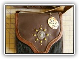 Shoulder bag with fur front.  Concho and Metal studs decorate this hand-made beauty.